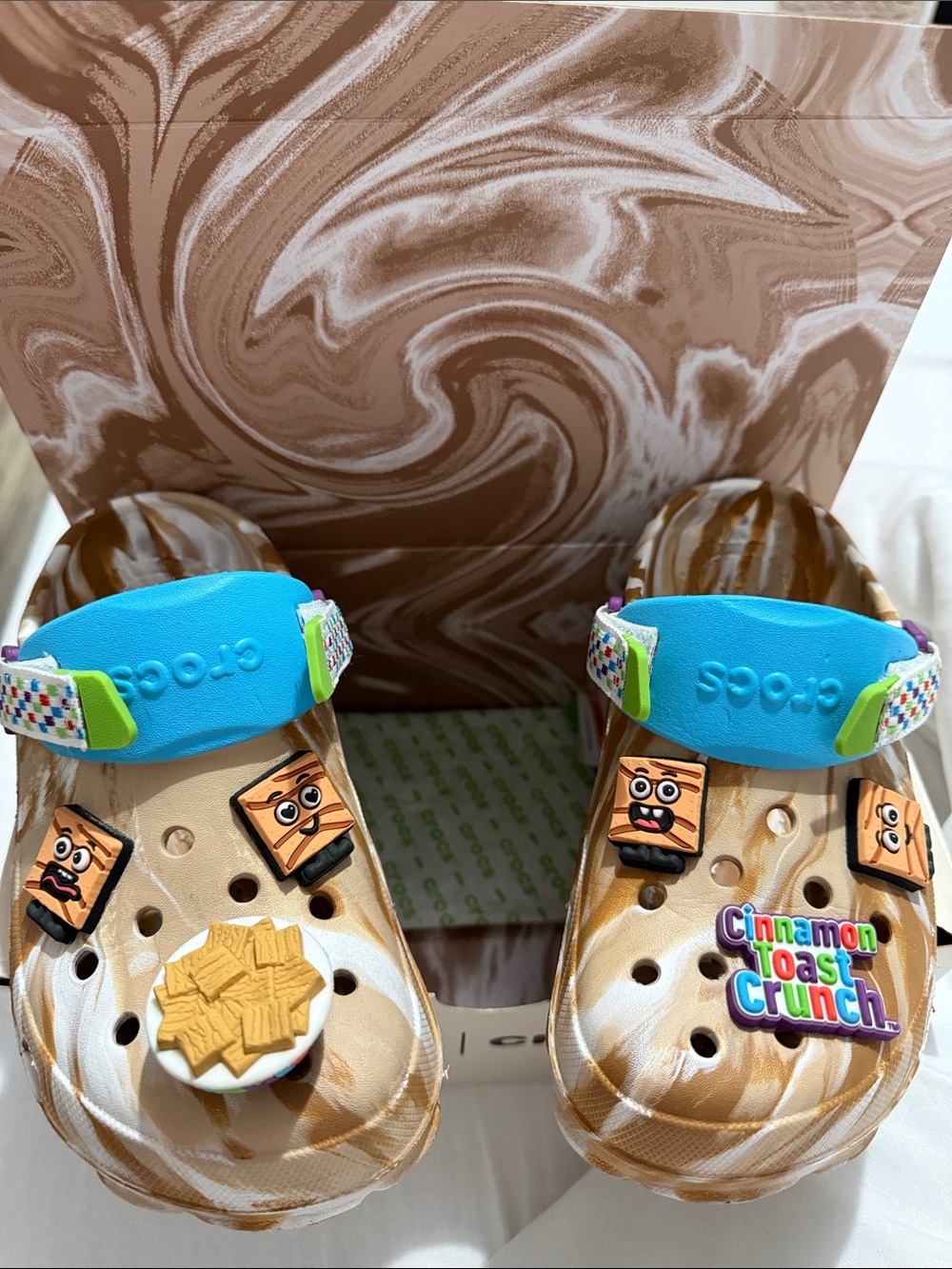 CROCS Cinnamon Toast Crunch Swirl Clogs with Blue Strap